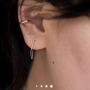 Single catbird ballerina earring.